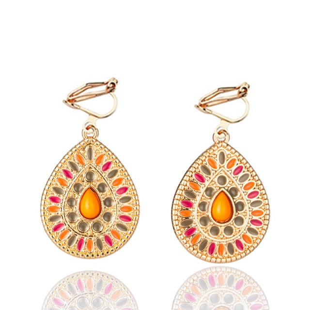 Pendientes de clip Queen Collage