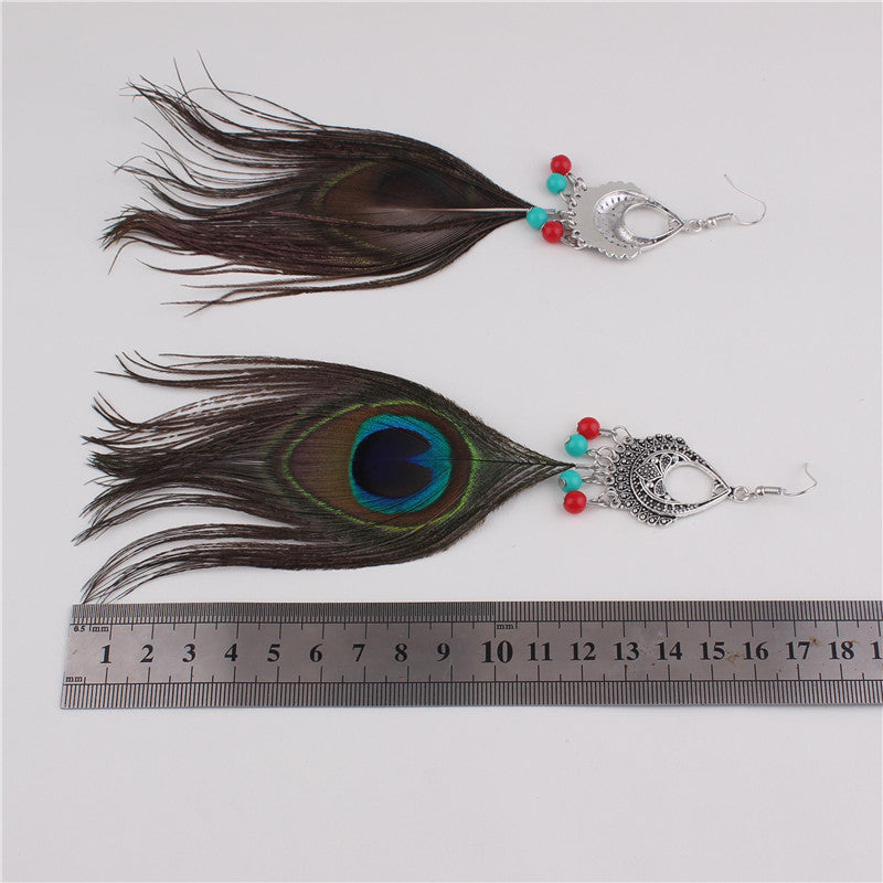 Pendientes de Agujero Drag Peacock