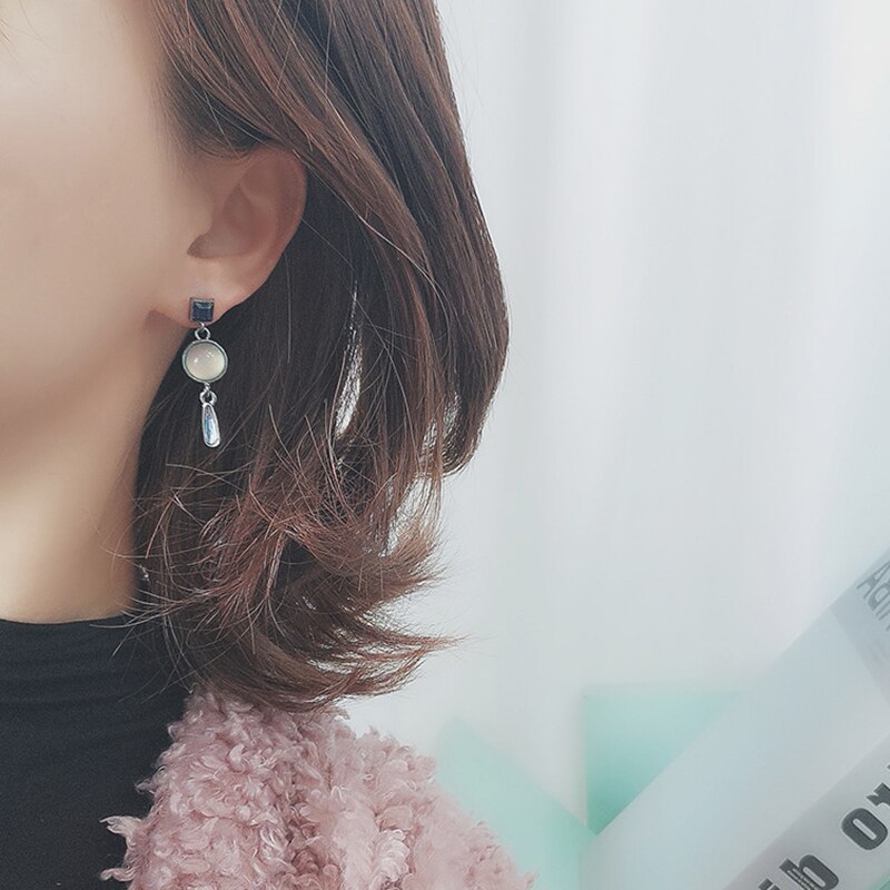 Pendientes de clip Queen Macron